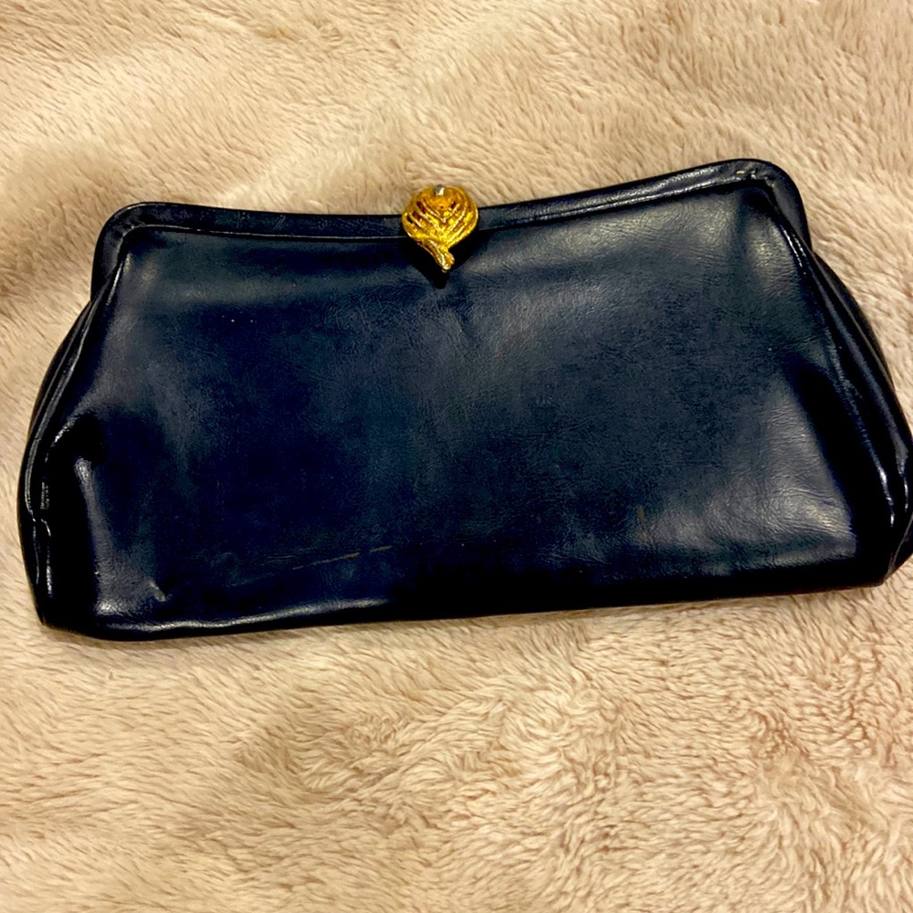 Vintage Black and gold mini handbag made out of real leather